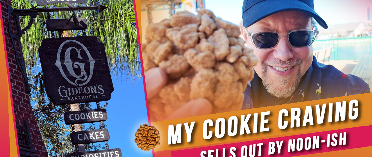 Hank holding a Gideon's Bakehouse coffee cake cookie at Disney Springs