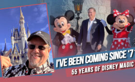 Hank celebrating the Walt Disney World 55th anniversary in front of Cinderella Castle at Magic Kingdom
