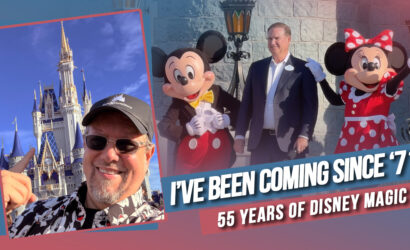 Hank celebrating the Walt Disney World 55th anniversary in front of Cinderella Castle at Magic Kingdom